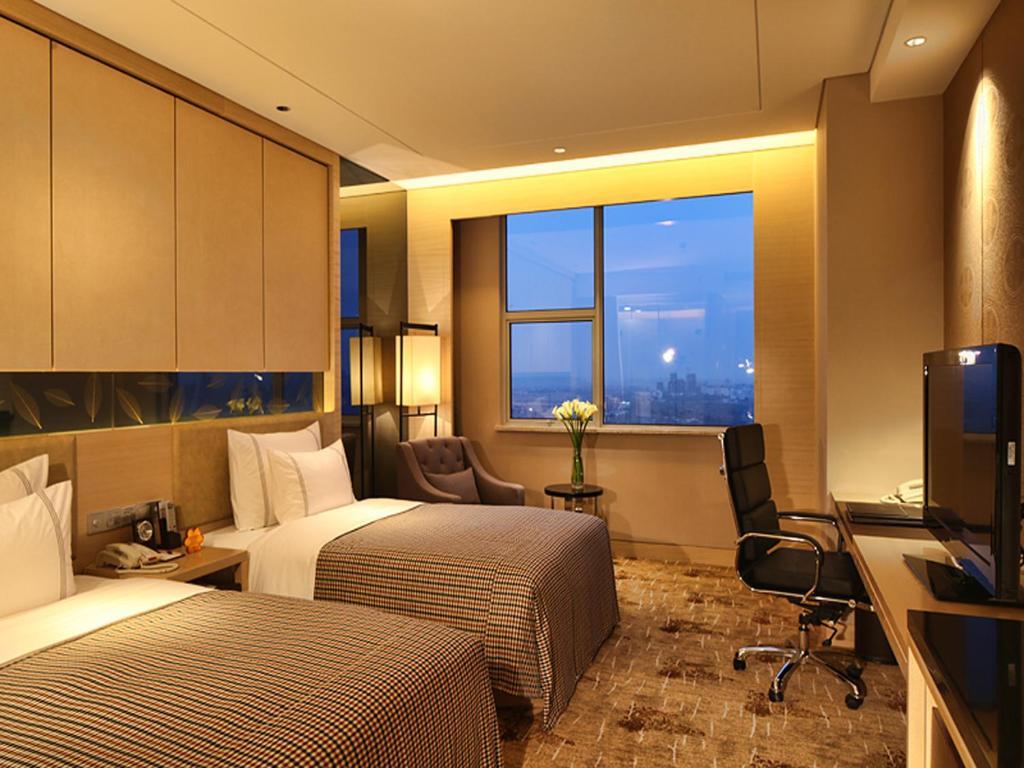 Grand Skylight International Hotel Ganzhou Chang Zhen Avenue Ruang foto